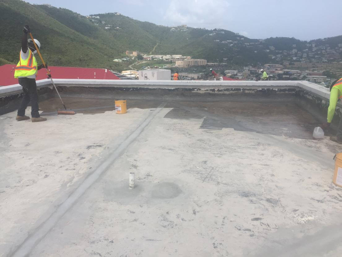 Sika Concrete Primer Lo-VOC polyurethane primer application on concrete deck.